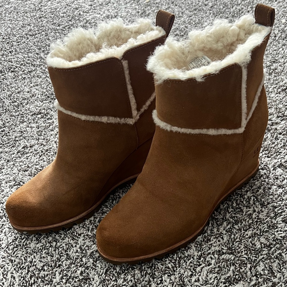 UGG Tan Shearling Lined wedge booties.